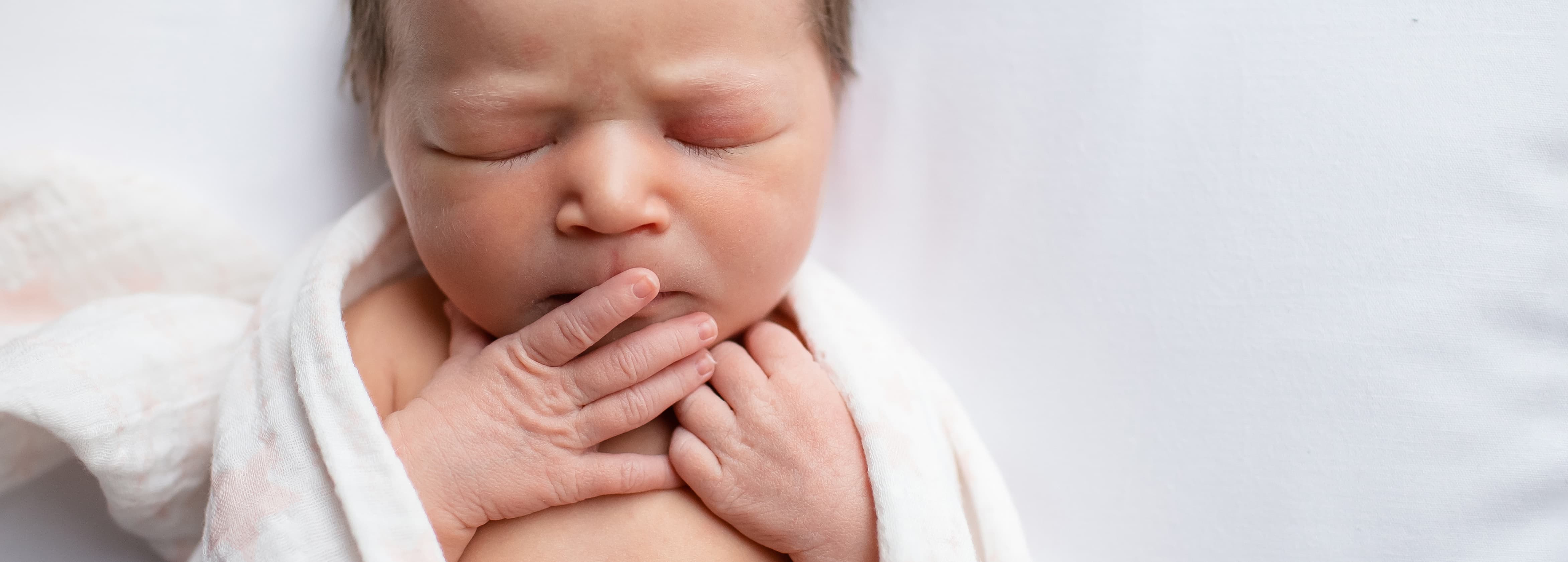 An image of newborn baby toes
